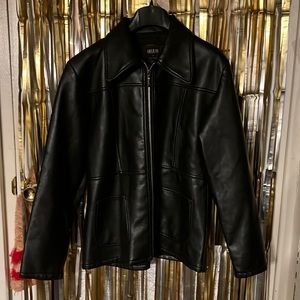 Vintage woman’s shape enhancing pleather jacket made by Helium.
